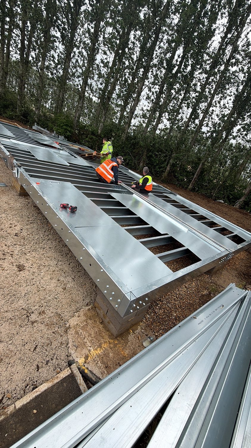 Modular steel frame components on the shop floor (photo 7 of 8)